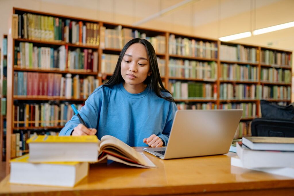 Student running an automated study workflow in a library